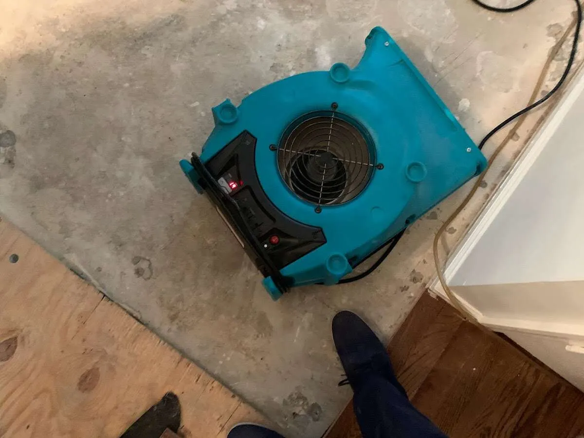 Air mover drying subfloor during Leak Detection & Repair in Asheboro